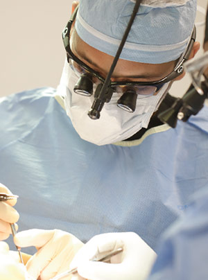 Dr. Jason Hamilton MD, perforated septum repair specialist performing surgery
